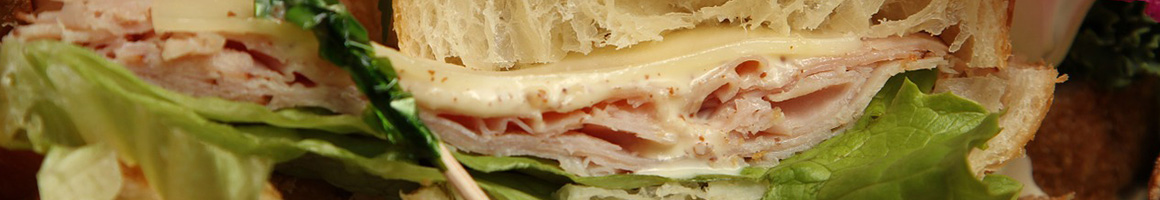 Eating Deli Sandwich Cafe at Woodstock Café restaurant in Alexandria, VA.